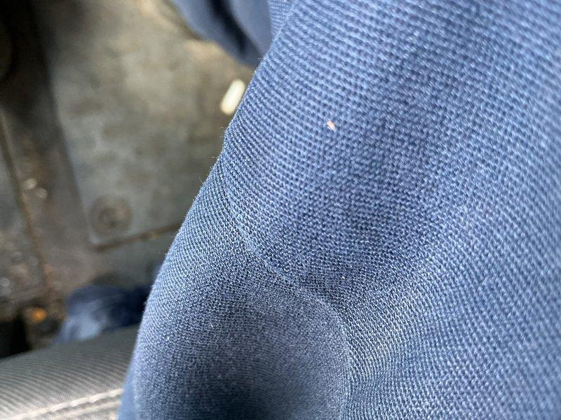 Completed water heater replacement in basement utility area. Removed existing unit and installed new white cylindrical water heater with proper venting connections, including metallic exhaust vent pipe with flexible ribbed ducting connected to rigid metal ductwork. Verified all copper pipe connections and ensured system integration with existing plumbing infrastructure.