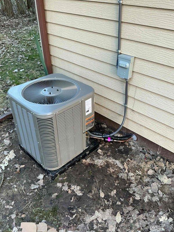Successfully completed full HVAC system installation including a Lennox 45,000 BTU furnace with humidifier and flue liner, 1.5 ton air conditioning condenser unit, and hot water heater replacement. All equipment was properly positioned, with the furnace installed in the mechanical room featuring complete ductwork connections and condensate drainage system, while the outdoor AC unit was mounted on a rubber isolation pad with refrigerant lines, electrical disconnect box, and conduit properly secured to exterior wall. System was tested, reconnected to existing infrastructure, and confirmed operational upon completion.