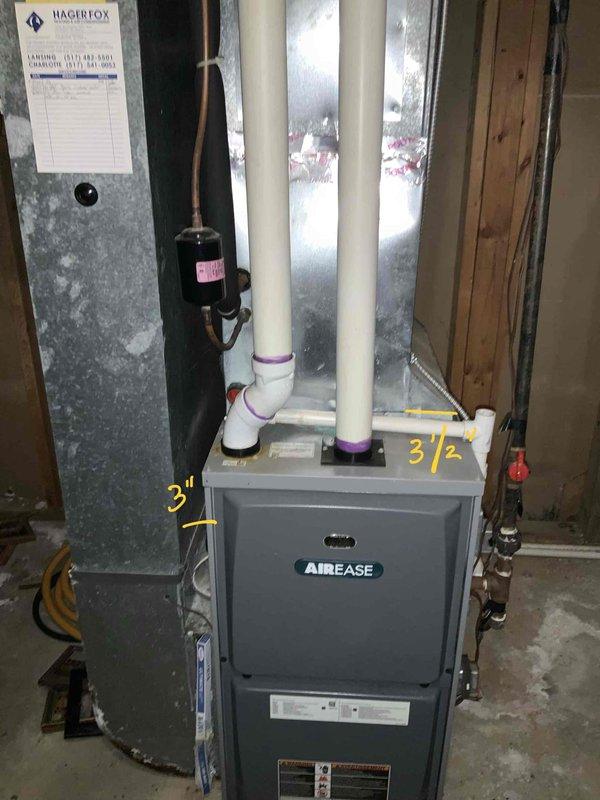 Completed HVAC estimate for replacement of sixteen-year-old air conditioning system in residential basement installation. Assessed existing AirEase furnace unit with connected air handler, evaluated ductwork configuration, PVC venting system with intake and exhaust pipes, and associated copper refrigerant lines. Documented current system specifications, measurements, and equipment layout including filter/drier components and electrical connections to provide comprehensive replacement quote for expedited installation as requested.
