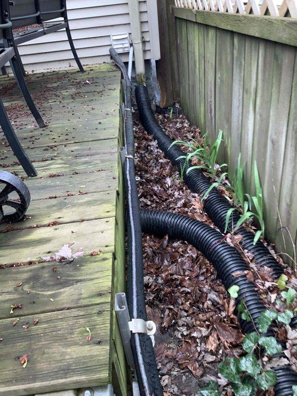 Conducted on-site evaluation of 7-year-old residential air conditioning system that is not operating efficiently and was previously serviced with recommendation for replacement. Assessed existing Gibson HVAC equipment installation in basement utility room and inspected outdoor unit location adjacent to deck area. Prepared comprehensive replacement estimate for air conditioning system only, documenting current equipment condition and site specifications for proposed installation.