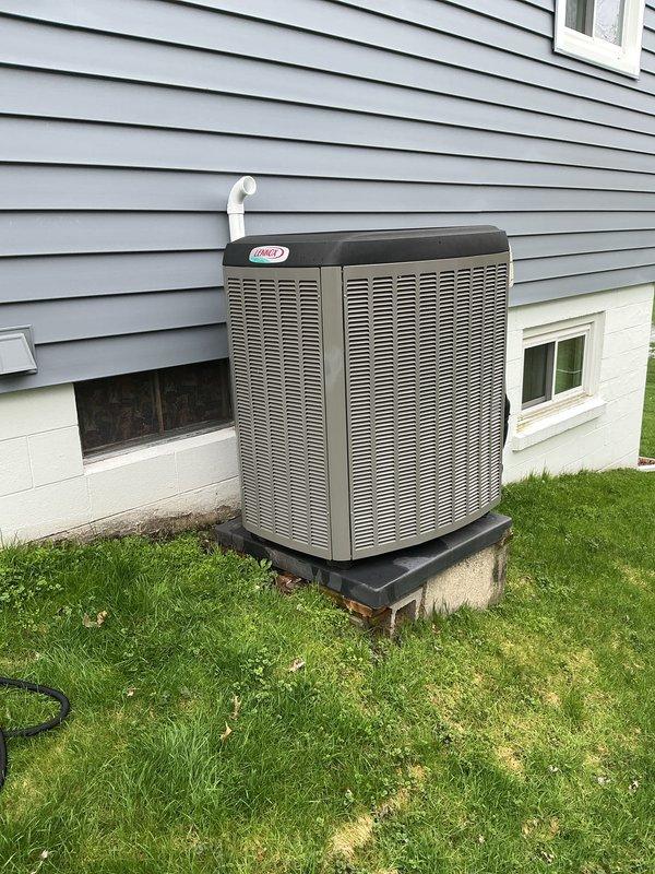 Completed annual cooling maintenance on residential Lennox air conditioning condenser unit. Performed comprehensive system inspection, changed air filter, and documented equipment condition with photos showing unit in good working order with no visible signs of wear or damage.