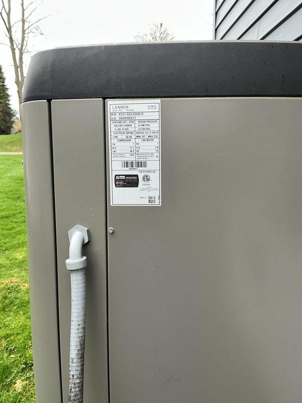Completed annual cooling maintenance on residential Lennox air conditioning condenser unit. Performed comprehensive system inspection, changed air filter, and documented equipment condition with photos showing unit in good working order with no visible signs of wear or damage.