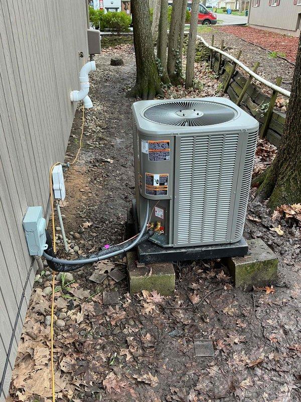 Completed full HVAC system installation including 90,000 BTU furnace, 3-ton air conditioning unit with left-side configuration, humidifier, and hot water heater in basement mechanical room. All equipment installed per manufacturer specifications with proper venting, refrigerant line connections, electrical disconnects, and PLC piping. System tested, operational, and ready for service with all required permits obtained.