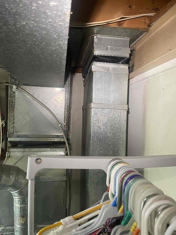 Conducted on-site evaluation of existing HVAC system located in basement utility closet for equipment replacement estimate. Air conditioning unit confirmed non-operational while furnace remains functional. Documented current system configuration including metal ductwork, flexible ducting connections, and air handler installation within confined mechanical space. Assessed existing infrastructure, clearances, and installation access for proposed furnace and air conditioning replacement equipment.