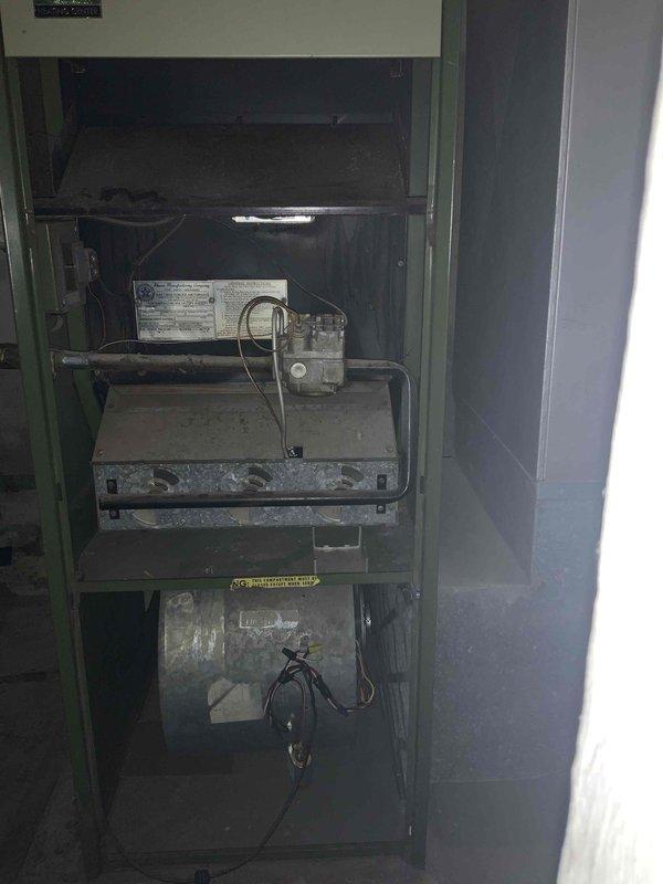 Completed on-site assessment and provided comprehensive replacement estimate for severely aged HVAC system at residential property. Evaluated existing 70-year-old gas furnace showing significant deterioration, dust accumulation, and outdated burner assembly with exposed internal components. Documented air conditioning unit requiring replacement due to age and inefficiency. Assessed basement mechanical room conditions including damaged ceiling panels, aging ductwork, and structural concerns affecting equipment installation accessibility. Provided detailed quote for complete HVAC system replacement including new furnace, air conditioner, and necessary ductwork modifications. Additionally evaluated existing fuse box electrical service and prepared estimate for upgrade to modern breaker panel to support new HVAC equipment electrical requirements and improve overall system safety and code compliance.