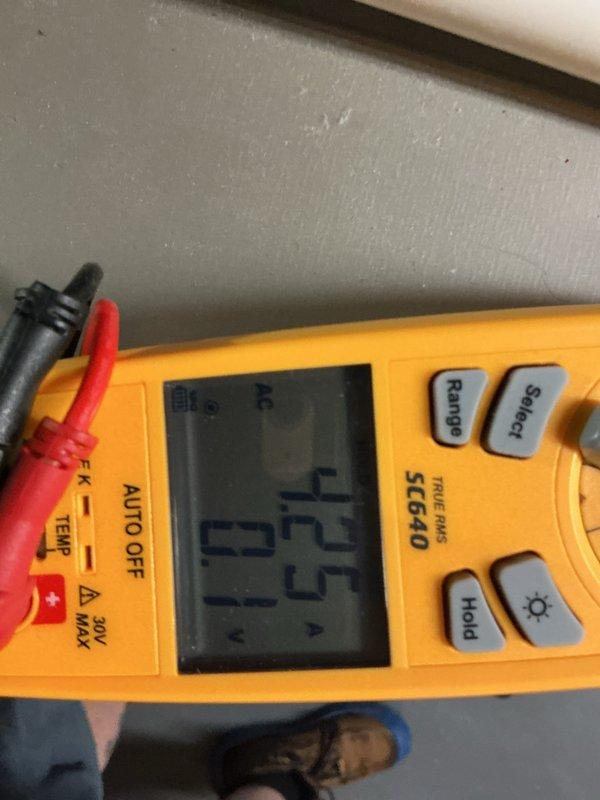 Completed annual HVAC maintenance inspection and testing. Performed electrical diagnostics using digital multimeter, verifying system voltage at 125V AC and measuring additional parameters at 497.8V, confirming proper electrical operation and system functionality.