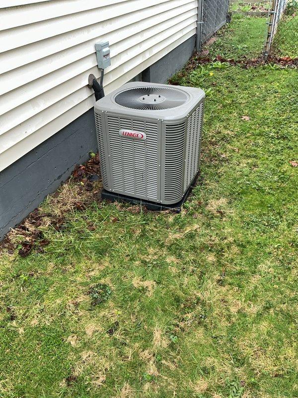 Completed scheduled Air Care Maintenance on Lennox outdoor condensing unit. Performed comprehensive system inspection including electrical connections at disconnect box, refrigerant line insulation integrity, and condenser coil condition. Unit operating within normal parameters with proper clearances maintained and level positioning on pad confirmed.