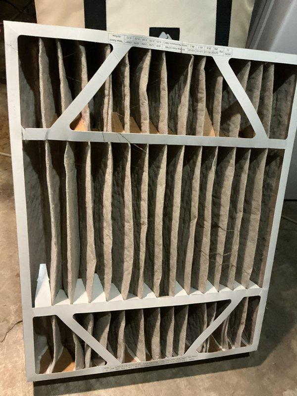 Completed comprehensive furnace heating maintenance tune-up on 10-year-old unit under membership agreement. Performed full system inspection including blower motor assembly, gas valve connections, electronic control board, and all electrical components. Inspected and documented heavily soiled air filter showing significant dust accumulation and discoloration, indicating proper filtration operation. Verified proper operation of ignition system, heat exchanger, burner assembly, and all safety controls. Tested gas pressure and connections for leaks, confirmed secure wiring throughout control board and motor circuits. All components found operating within manufacturer specifications with no immediate repairs required at this time.