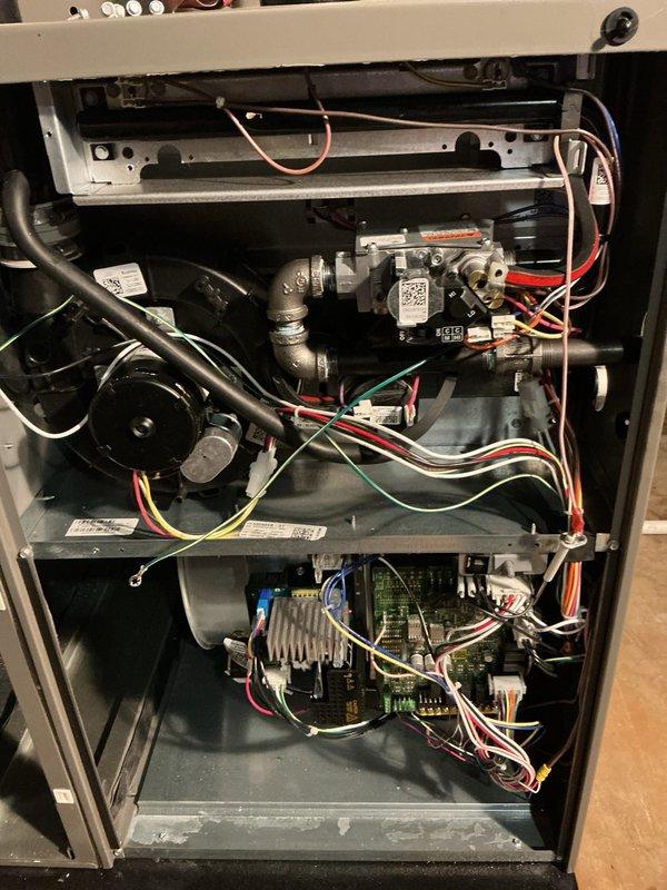 Completed comprehensive furnace heating maintenance tune-up on 10-year-old unit under membership agreement. Performed full system inspection including blower motor assembly, gas valve connections, electronic control board, and all electrical components. Inspected and documented heavily soiled air filter showing significant dust accumulation and discoloration, indicating proper filtration operation. Verified proper operation of ignition system, heat exchanger, burner assembly, and all safety controls. Tested gas pressure and connections for leaks, confirmed secure wiring throughout control board and motor circuits. All components found operating within manufacturer specifications with no immediate repairs required at this time.