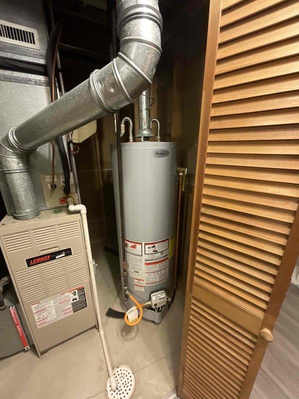 Conducted on-site assessment for complete split system HVAC replacement, evaluating existing Lennox furnace and air conditioning equipment in residential utility closet. Documented current installation configuration including ductwork routing, electrical panel capacity, water heater clearances, and mechanical room access constraints to provide accurate replacement quote with target completion by end of April.