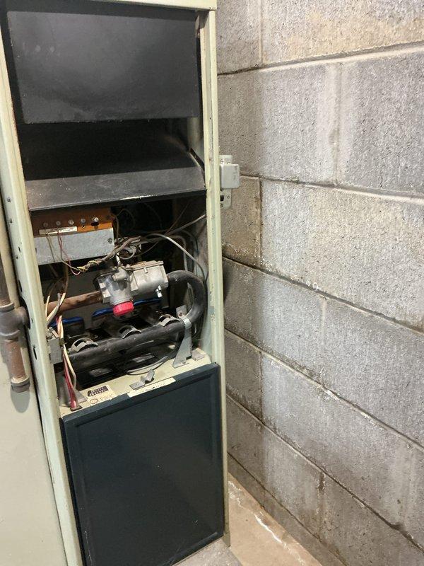Completed routine maintenance on secondary furnace system. Performed comprehensive inspection of blower motor assembly, control board connections, and electrical components. Verified proper operation of all system functions, checked wiring connections for security, and documented equipment condition through photographic records for service history.
