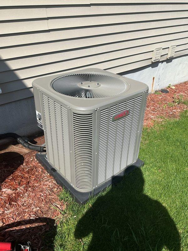 Completed annual cooling maintenance on residential outdoor condensing unit. Performed comprehensive system inspection including cleaning of condenser coils, verification of refrigerant levels, electrical connections testing, and operational assessment of all components. Unit found in good working condition with proper airflow through ventilation grilles, functioning fan motor, and secure mounting on vibration dampening pad with adequate clearances maintained for optimal performance.