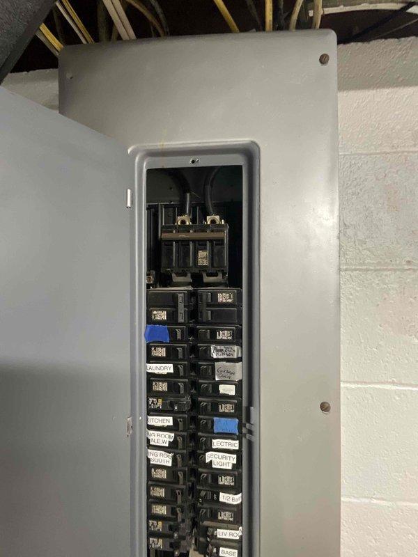 Conducted on-site evaluation for central air conditioning system installation at property currently without existing AC infrastructure. Assessed electrical panel capacity and existing circuit breaker configuration to determine compatibility for new AC unit installation, documenting current electrical service capabilities and available breaker spaces for future equipment connection. Provided comprehensive estimate for complete AC system installation including equipment specifications and electrical requirements necessary to establish functional cooling system.