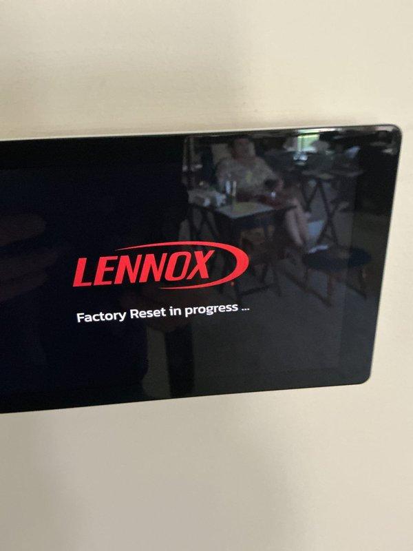 Responded to warranty call for thermostat malfunction. Replaced faulty thermostat with new Lennox S40 model under parts and labor warranty coverage. Performed factory reset on new unit to complete installation and ensure proper system operation.