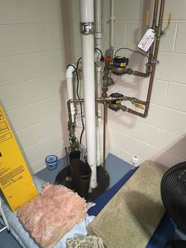 Completed on-site assessment for whole-home standby generator installation at a 33-year-old residential property. Evaluated existing electrical infrastructure, including main service panels and circuit breaker configuration, to determine generator sizing requirements and transfer switch placement options. Photographed electrical panels, plumbing systems, and utility areas to assess clearance requirements and optimal generator pad location for either Kohler or Generac unit installation. Documented current electrical service capacity and identified necessary electrical connections for automatic transfer switch integration with existing panel configuration.