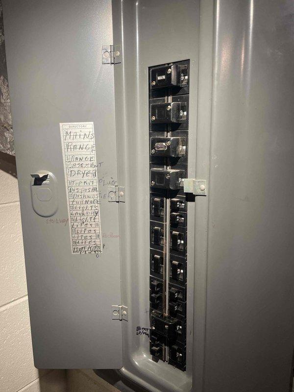 Conducted comprehensive evaluation of existing gas furnace and air conditioning system to assess repair versus replacement options. Documented current equipment configuration including furnace unit, electrical panel setup with main and secondary panels, and associated ductwork in basement mechanical room. Provided detailed assessment and replacement recommendations based on equipment condition and system performance evaluation.