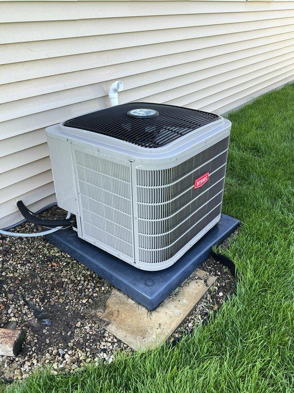 Performed annual preventative maintenance on Bryant residential air conditioning system. Inspected outdoor condenser unit, finding equipment in good operating condition with clean coil fins and proper clearances. Replaced air filter and checked system operation. Unit tested successfully with no issues identified. System ready for cooling season.
