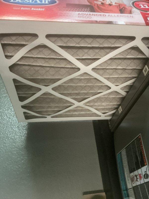 Completed routine ACM preventive maintenance service on residential HVAC system. Inspected and replaced air filter with new BestAir Advanced Allergen 8500 unit, photographed existing filter condition showing standard wear. Inspected condensate pan and drainage system, noting accumulated organic debris which was documented for maintenance records. All system components operating within normal parameters upon completion of service visit.