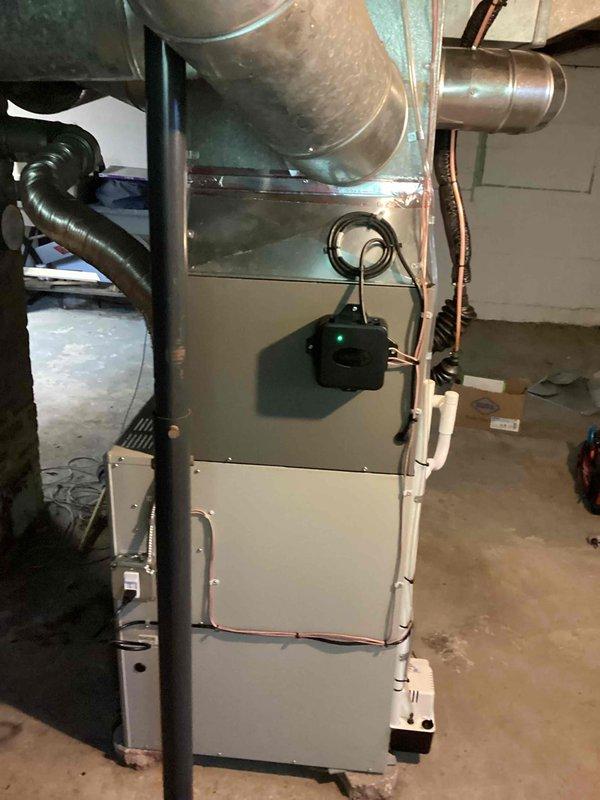 Successfully completed installation of a 1.5-ton air conditioning system with matching evaporator coil in basement utility area. Installed new dedicated electrical circuit to properly power the AC unit, ensuring compliance with electrical code requirements. System was positioned with rear discharge configuration and integrated with existing ductwork infrastructure, including connection of refrigerant lines and condensate drainage. All mechanical and electrical permits were secured prior to installation. Unit was tested for proper operation, refrigerant charge verified, and airflow confirmed through supply and return duct systems.