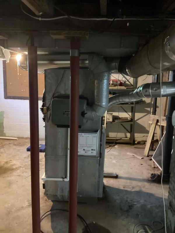 Successfully completed installation of a 1.5-ton air conditioning system with matching evaporator coil in basement utility area. Installed new dedicated electrical circuit to properly power the AC unit, ensuring compliance with electrical code requirements. System was positioned with rear discharge configuration and integrated with existing ductwork infrastructure, including connection of refrigerant lines and condensate drainage. All mechanical and electrical permits were secured prior to installation. Unit was tested for proper operation, refrigerant charge verified, and airflow confirmed through supply and return duct systems.