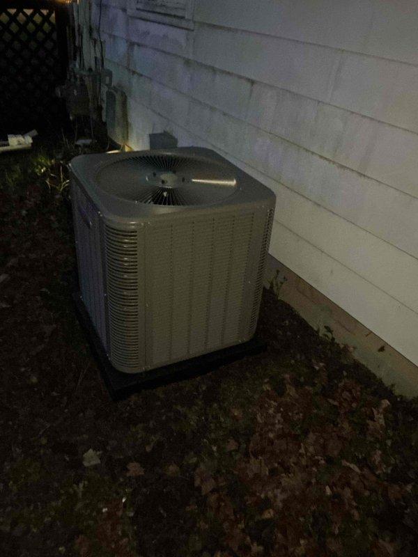 Completed full installation of 2.5-ton air conditioning system with matching evaporator coil. Installed outdoor condensing unit on pad against exterior wall with proper clearances, connected refrigerant lines, and mounted indoor coil to existing air handler in basement. System was evacuated, charged to manufacturer specifications, tested for proper operation, and all electrical connections were verified. Mechanical permit obtained prior to installation.