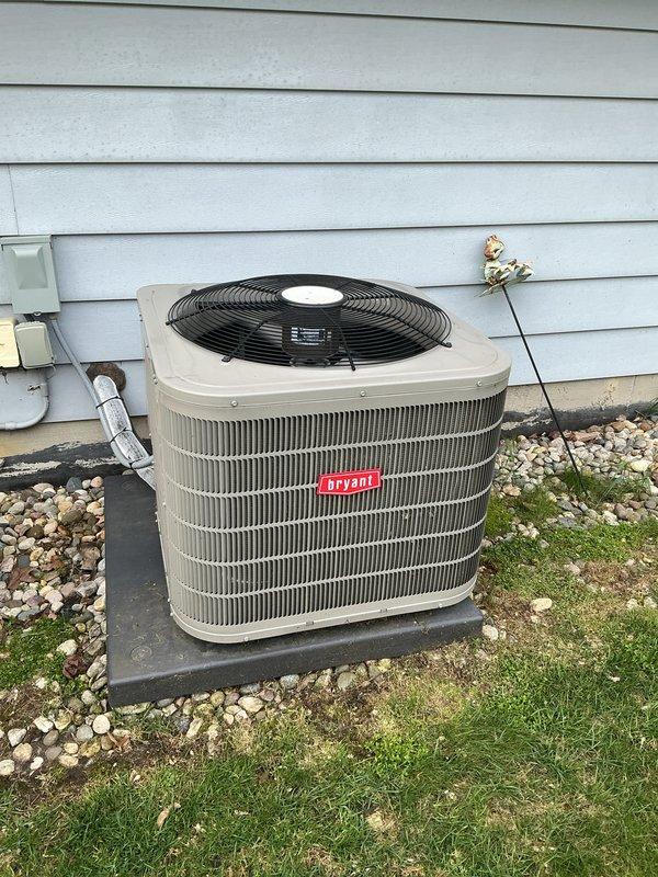 Completed scheduled air conditioning maintenance on Bryant residential condenser unit. Delivered replacement air filter as requested per urgency list, with service appointment rescheduled to earlier date to accommodate customer needs. Documented equipment condition with photographs showing unit in operational status on concrete pad with proper clearances maintained.