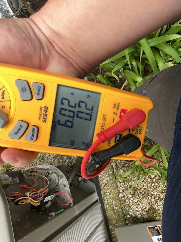 Completed annual cooling maintenance on HVAC system. Performed comprehensive electrical diagnostics using digital multimeter to test capacitor functionality and verify proper voltage readings on outdoor condensing unit. Measured and confirmed electrical components operating within manufacturer specifications. Inspected and tested system controls and wiring connections. All measurements recorded normal operating parameters, indicating system is functioning properly for the cooling season.