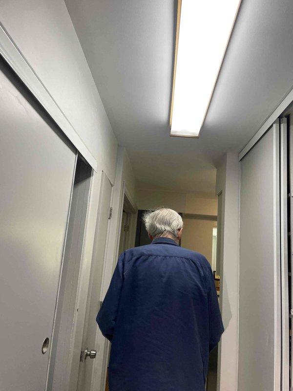 Conducted site assessment for new air conditioning system installation in single-story, 3-bedroom residence currently equipped with steam heating only. Evaluated attic space for equipment placement and ductwork routing, documented existing conditions including interior layout and structural considerations. Photographed utility areas and hallway access points to determine optimal installation pathway for refrigerant lines and condensate drainage. Prepared comprehensive estimate for complete AC system installation including outdoor condensing unit, indoor air handler, thermostat, and full ductwork distribution network to serve all living areas.