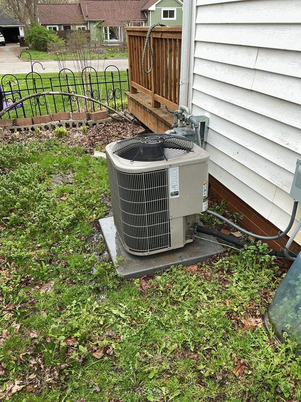 Completed annual cooling maintenance on residential outdoor condensing unit. Performed comprehensive system inspection including visual assessment of unit condition, refrigerant line connections, electrical conduit, and mounting pad stability. Unit found in good operating condition with proper clearances maintained and all components functioning as designed.