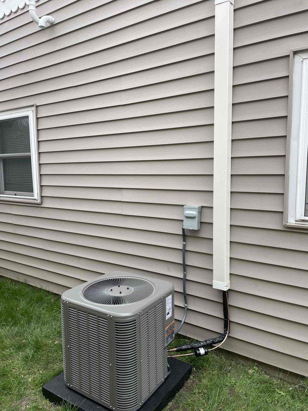 Completed full HVAC system installation including a 45,000 BTU furnace and 1.5-ton air conditioning unit with right-side configuration. Installed new electrical circuit with dedicated disconnect, ran refrigerant lines and electrical conduit along exterior siding to new condenser unit positioned on concrete pad. Obtained mechanical and electrical permits prior to installation. Verified all electrical connections, tested system operation, and confirmed proper airflow and refrigerant charge levels. All equipment installed to manufacturer specifications and local code requirements.