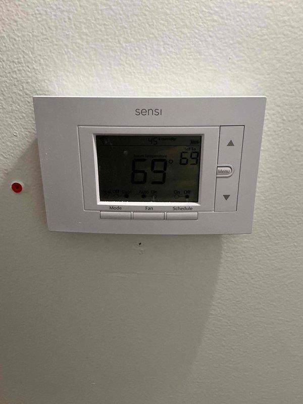 Completed full HVAC system installation including a 70,000 BTU furnace and 2.5-ton air conditioning unit with rear placement configuration. Installed new dedicated electrical circuit to support the system and programmed Sensi digital thermostat for optimal climate control. Obtained mechanical and electrical permits prior to installation and verified all components are operating within manufacturer specifications.