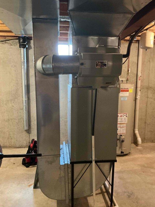 Performed diagnostic evaluation of 17-year-old furnace and 24-year-old tank-style water heater for new homeowners concerned about operating costs and hot water capacity. Inspected furnace operation, combustion efficiency, and ductwork connections; unit functioning within normal parameters but showing age-related wear. Evaluated water heater performance, noting original 2002 installation with visible aging of components, controls, and plumbing connections. Documented equipment conditions with photographs and provided recommendations for system optimization and future replacement planning given the advanced age of both units.