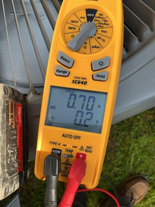 Completed scheduled Air Care Cooling maintenance on 4-ton split system air conditioning unit. Performed comprehensive system diagnostics including electrical measurements with digital multimeter, recording amperage draw of 0.70A and verifying proper voltage levels at outdoor condensing unit. Inspected condenser coil fins and overall equipment operation to ensure system functionality and efficiency per recurring maintenance protocol.