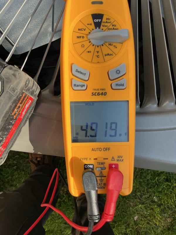 Completed scheduled Air Care Cooling maintenance on 4-ton split system air conditioning unit. Performed comprehensive system diagnostics including electrical measurements with digital multimeter, recording amperage draw of 0.70A and verifying proper voltage levels at outdoor condensing unit. Inspected condenser coil fins and overall equipment operation to ensure system functionality and efficiency per recurring maintenance protocol.