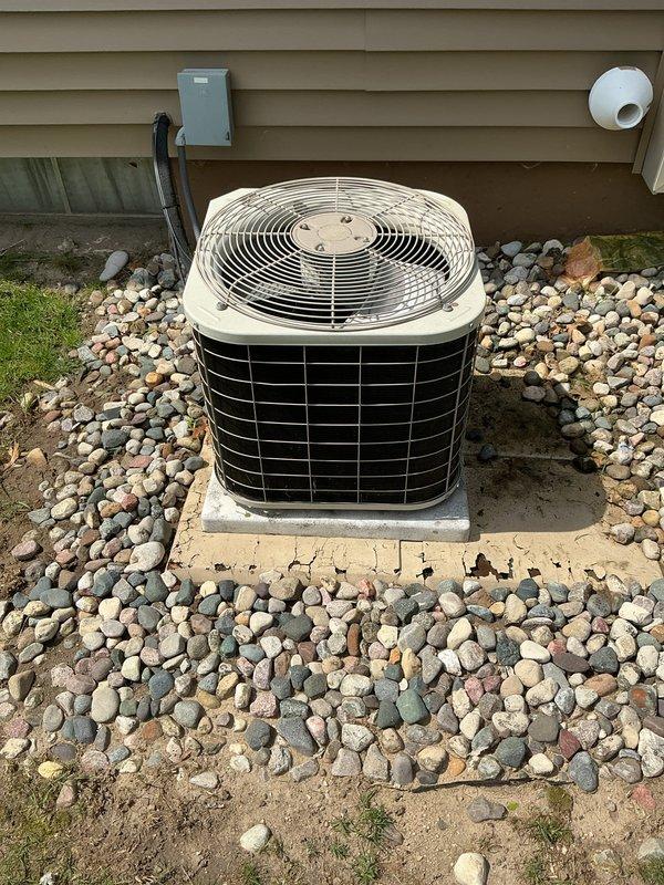 Completed scheduled Air Care Maintenance on residential cooling system. Inspected outdoor condenser unit, replaced air filter, and installed new evaporative cooler pad. Unit operating within normal parameters with proper airflow and no immediate service concerns identified.
