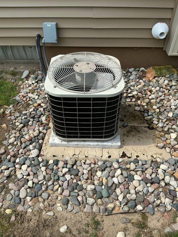 Completed scheduled Air Care Maintenance on residential cooling system. Inspected outdoor condenser unit, replaced air filter, and installed new evaporative cooler pad. Unit operating within normal parameters with proper airflow and no immediate service concerns identified.