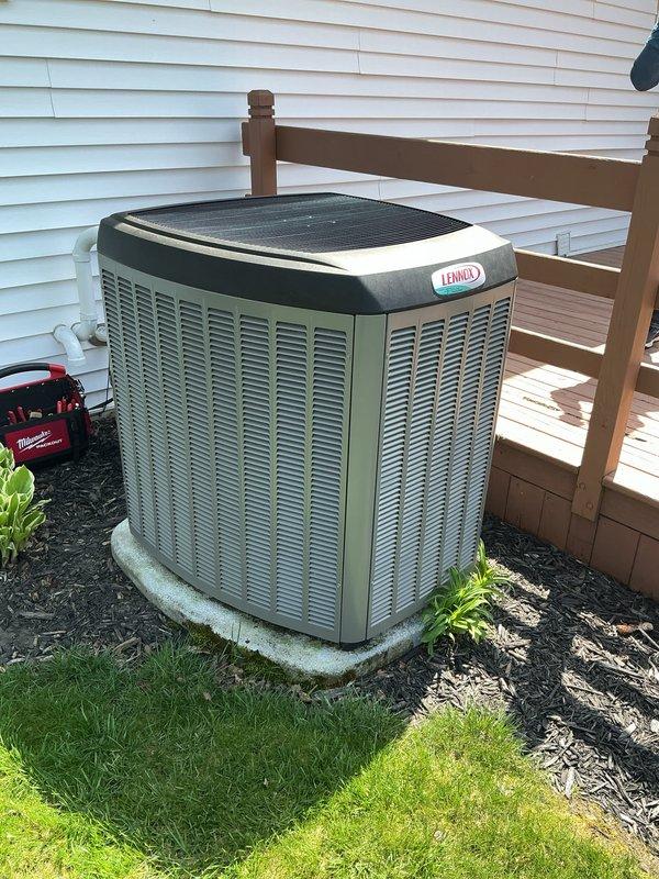 Completed annual cooling maintenance on residential Lennox condensing unit. Inspected condenser coil and found half spots on filter requiring attention. Unit operational and ready for cooling season.