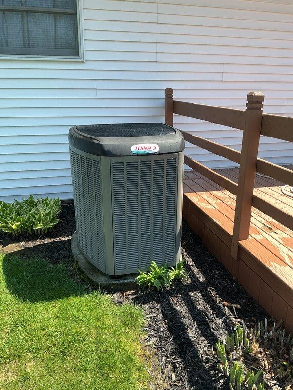 Completed annual cooling maintenance on residential Lennox condensing unit. Inspected condenser coil and found half spots on filter requiring attention. Unit operational and ready for cooling season.