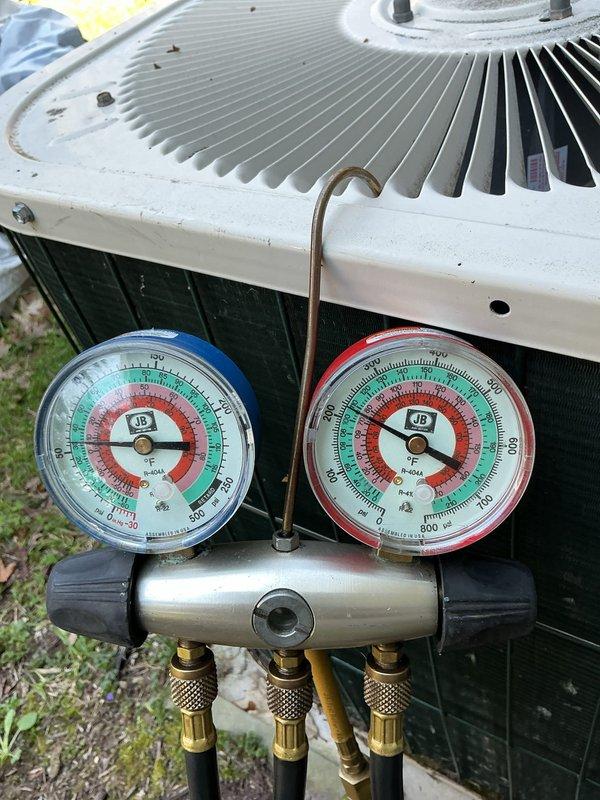 Completed scheduled preventive maintenance on residential HVAC system, performing Air Care Heating and Air Care Cooling service protocols. Utilized refrigerant manifold gauges to check system pressures and verify proper refrigerant charge on outdoor condensing unit. Inspected condenser unit operation, fan assembly, and electrical connections to ensure optimal system performance for both heating and cooling functions.