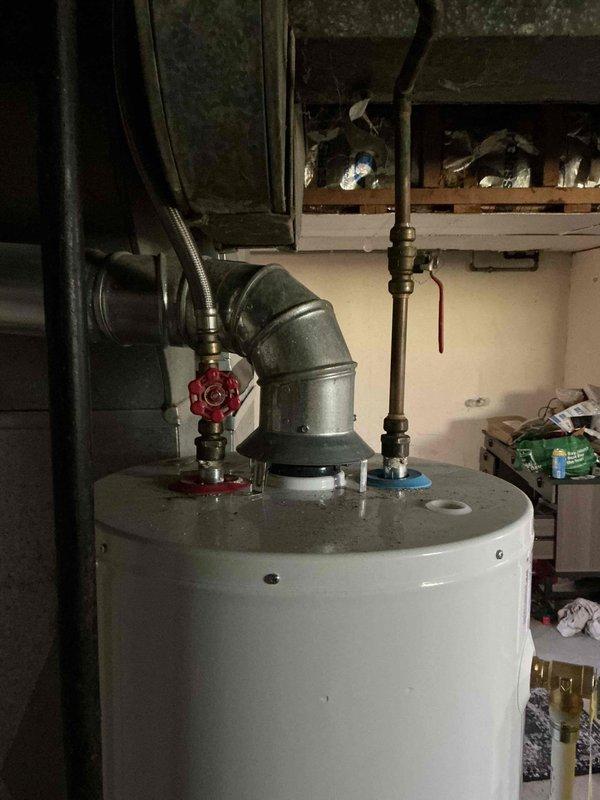 Performed city certification inspection of residential HVAC system and water heater. Verified proper operation of all equipment, inspected electrical panel and circuit breakers, examined water heater connections and safety controls, and documented system conditions with photographs. Homeowner was advised to have all required certification paperwork available for processing.