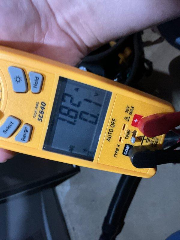 Completed annual heating maintenance on residential furnace system. Performed comprehensive inspection of internal components including blower motor assembly, gas valve, electrical connections, and control board. Verified proper electrical operation with multimeter reading of 35.01 volts, confirming system is functioning within normal parameters.