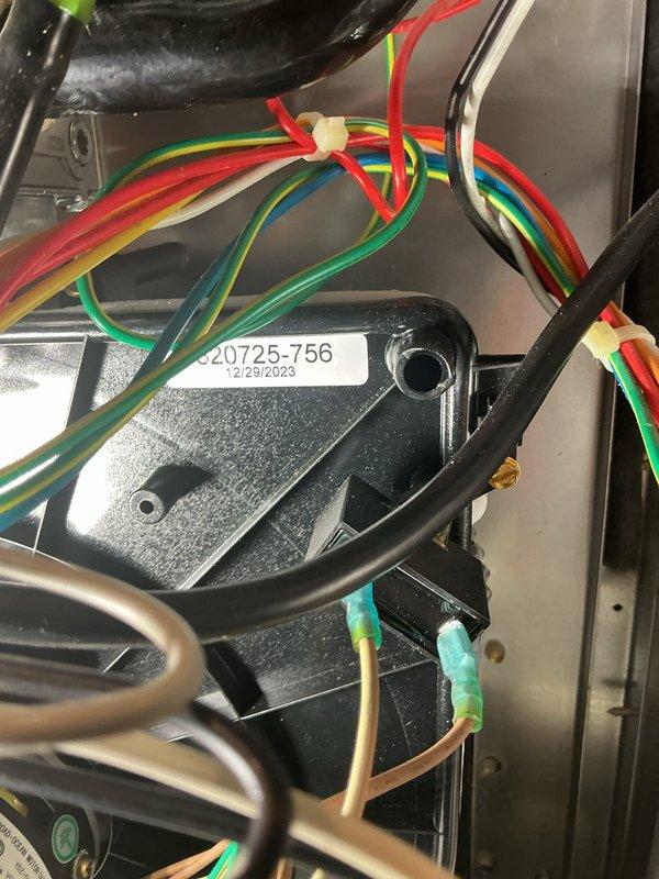 Responded to no-heat call on 2019 furnace located in basement. Upon inspection, diagnosed faulty control board (part #20725-756 dated 12/25/2023) preventing heating cycle from initiating despite blower operation. Inspected evaporator coil assembly and verified all low-voltage control wiring connections. Documented equipment condition with photos of control board wiring and coil assembly for service records.