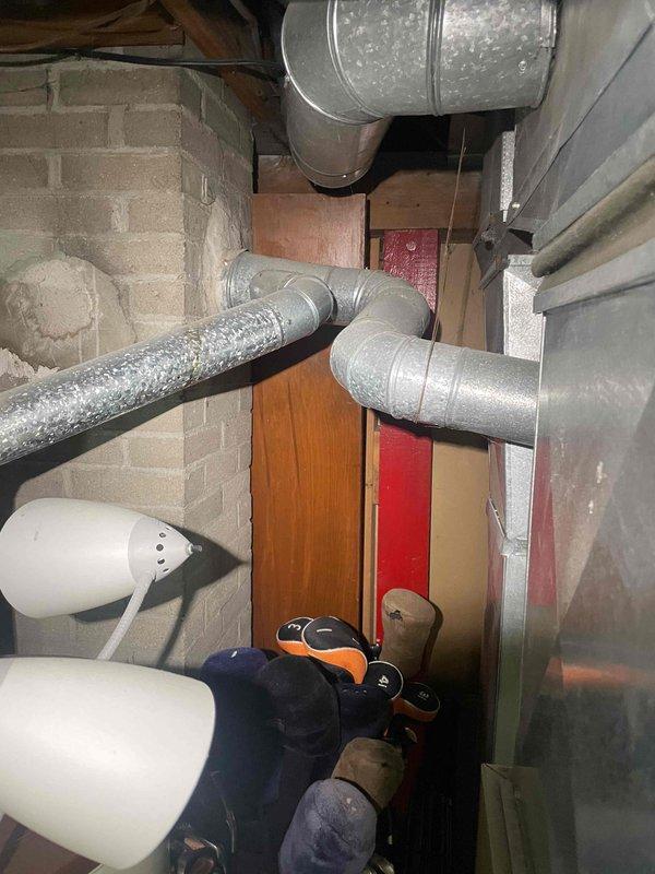 Conducted site assessment for new air conditioning system installation at owner-occupied residential property currently without AC. Evaluated existing HVAC ductwork infrastructure in basement area, including metallic and flexible insulated ducts, to determine compatibility with proposed cooling system. Inspected electrical panel capacity and circuit availability to ensure adequate power supply for new AC equipment installation planned for current season.