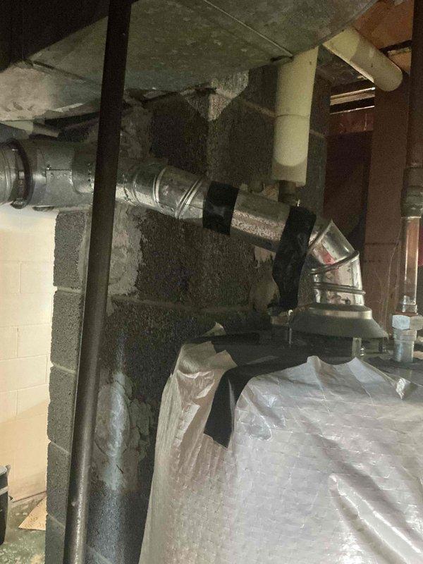 Responded to no-heat call on a 20-year-old forced air furnace system that was not turning on. After assessment, provided comprehensive estimate for full HVAC system replacement including new furnace and air conditioning equipment per promotional offer. Documented existing basement installation with metallic ductwork and exterior electrical service configuration for replacement planning.