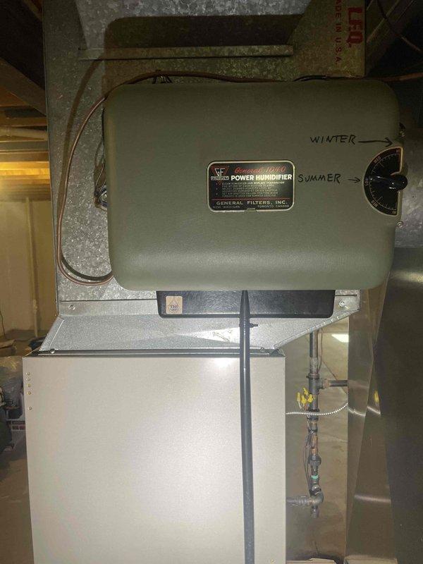 Conducted comprehensive on-site evaluation for complete HVAC system replacement, including existing furnace and air conditioning unit. Assessed current equipment configuration, ductwork, humidifier system, and auxiliary components in mechanical room to determine specifications for new installation. Documented existing setup including PVC condensate drainage, power humidifier with seasonal controls, and cabinet-style furnace assembly to ensure proper sizing and compatibility for replacement system, and provided detailed quote for full system upgrade including filter and condenser pad replacement.