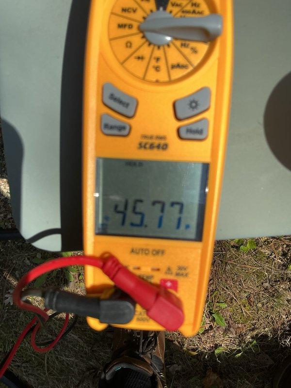 Completed annual cooling maintenance on residential HVAC system. Performed comprehensive system inspection, recorded electrical readings showing 579 amps and 4577 ohms resistance, replaced air filters and evaporative cooling pads as needed, and verified all components operating within normal parameters.