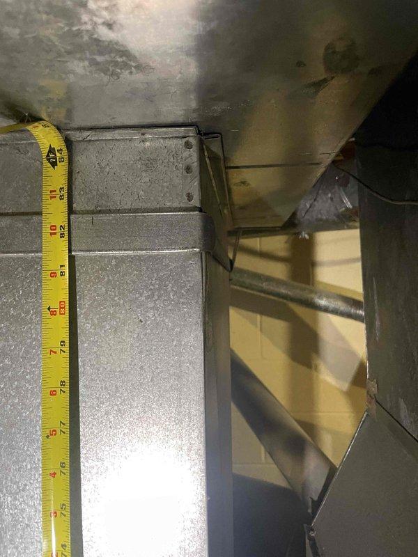 Conducted site visit to assess 15-year-old furnace and air conditioning system for replacement estimate. Performed measurements of existing HVAC ductwork and evaluated mechanical space conditions, documenting significant water damage and moisture staining on ceiling surfaces above ductwork that may require remediation consideration during equipment replacement. Customer ready to proceed with full system replacement of both heating and cooling units.