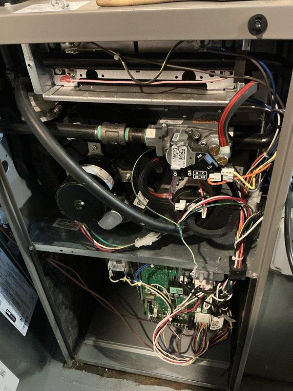 Completed comprehensive ComfortGuard maintenance package on residential furnace system. Performed full system inspection including gas valve assembly, blower motor, control board diagnostics, and electrical connections verification. All components photographed and documented showing proper operation with no deficiencies noted; unit tested and confirmed operating within manufacturer specifications.