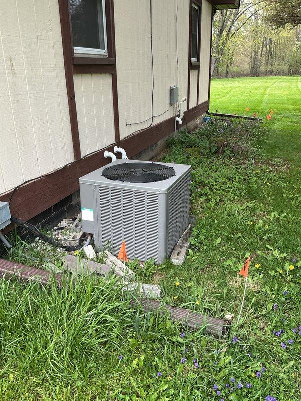 Responded to callback for propane leak following furnace installation. Inspected gas piping connections at furnace, identified leak at black iron pipe elbow fitting. Tightened threaded connections and verified proper seal at coupling joint. Performed leak detection test on all gas line connections using approved leak detection solution. Confirmed no further leaks present at furnace or gas supply piping. Also completed annual cooling maintenance on outdoor condensing unit as scheduled. Inspected condenser coil, verified refrigerant line connections, and checked electrical connections at unit. System operating within normal parameters.