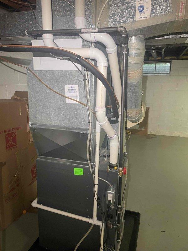 Conducted on-site evaluation of existing 16-year-old air conditioning system located in basement mechanical room. Assessed current HVAC equipment configuration including furnace, air handler, and associated ductwork and PVC condensate piping. Documented existing installation layout, equipment accessibility in crawl space and basement areas, insulation conditions, and structural considerations for replacement. Provided comprehensive estimate for single component AC system replacement with recommendations for equipment sizing and installation approach based on current infrastructure and customer's timeline for replacement within the next couple weeks.